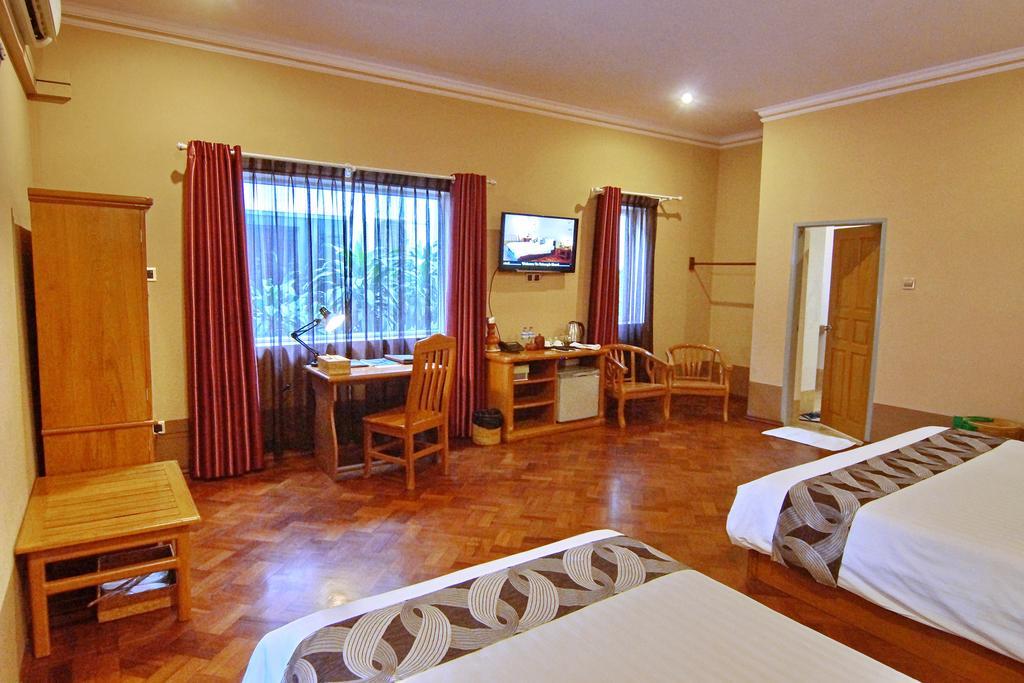 Triumph Hotel Мандалай Экстерьер фото